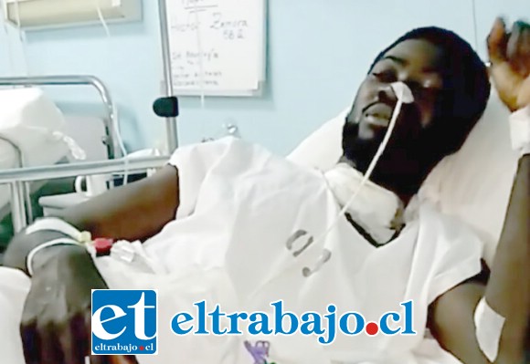 El ciudadano haitiano Lesly Clairzine logró sobrevivir a las graves cortes en su cuello sufridas en la Villa Sol Naciente de San Felipe (Captura: Aconcaguahaiti.cl)