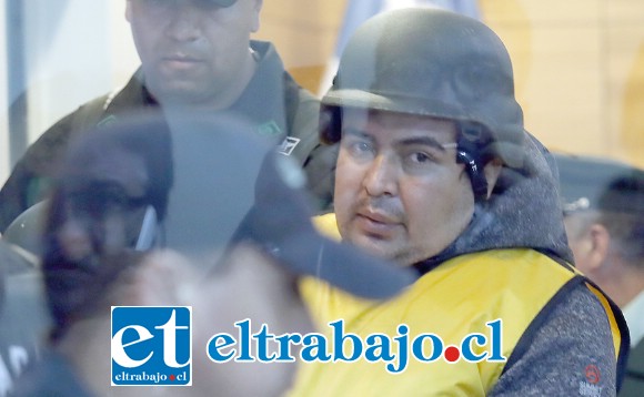 El imputado Miguel Andrés Espinoza Aravena debió ser fuertemente protegido durante su formalización en 2018.